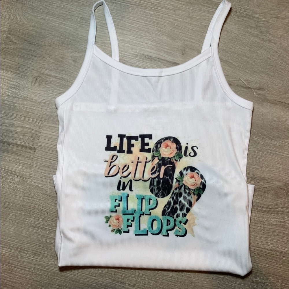 Woman’s Life is better in flip flops scoop neck tank shirt.